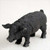 Miniature black pig figurine with floppy ears and a curled tail, a bonsai accessory