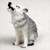 Miniature gray wolf figurine sitting and howling, a decorative bonsai accessory