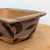 Close-up of the flared rim on the Bruce Lenore bonsai pot, No. 79