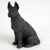 Miniature Great Dane figurine in matte black, seated alert with upright ears