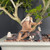Close-up of the handcrafted Chinese mudman fisherman figurine