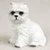 Miniature West Highland White Terrier figurine with a bright white textured coat