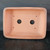 A top-down interior view of a 14-inch unglazed Yixing bonsai pot, showcasing its rectangular shape with smooth, rounded corners. The pot is crafted from warm, matte reddish-brown clay, typical of traditional Yixing pottery, which provides a natural and earthy aesthetic. 

The base of the pot features two large, centrally located circular drainage holes to ensure proper soil aeration and water runoff. Additionally, four smaller circular holes are positioned near each corner for securing bonsai wire to stabilize a tree. A faint white identification code, "YX1094," is marked on the inner bottom edge. The pot has a thick, flat rim and is photographed against a dark, neutral background while resting on a black, textured surface.