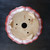 Underside of the 9 inch round red glazed Yixing bonsai pot