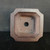 Deep square interior of the speckled clay cascade pot