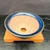 Overhead angled view of the 5.25 inch round Kakuzan Tokoname pot