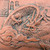 Close-up of the hand-carved dragon relief on the Tokoname clay plaque