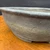 Close-up of the 7 inch vintage Seizan Kiln unglazed round bonsai pot