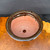 Shuho handmade round flared brown glazed bonsai pot top view