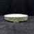 10 inch oval John Fazzino bonsai pot in a deep green glaze with diagonal carving