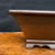 Close view of the cascade pot's flared rim and scalloped foot