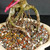Close-up of imported Chinese Elm exposed root base showing raised roots, fine feeder roots, textured bark, bonsai soil mix, fertilizer pellets, pink inventory tag, and cream glazed pot rim.