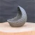 Handcrafted dark grey concrete planter with a crescent moon shape