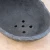 Close-up of the interior of the matte black ceramic planter