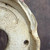 Close-up of small chip on underside of vintage Yamaaki bonsai pot, shown for condition detail and transparency.