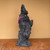 Front view of a tall handmade black Ibigawa-style planting rock with an irregular mountain profile, multiple peaks, openings and a wide textured base.