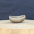 3.5 inch unglazed natural clay oval bonsai pot handmade by Bruce Lenore, side view on a wooden stand, No. 178