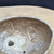 Looking into Bruce Lenore bonsai pot No. 178, showing the drainage holes