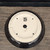 Bottom of Andy Arnault bonsai pot No. 741 with drainage holes and the potter's chop