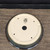 Bottom of Andy Arnault bonsai pot No. 742 with drainage holes and the potter's chop