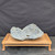 Preston Duncan handmade bonsai slab PD-025, gray finish, raised front view on a display stand