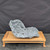 Preston Duncan handmade bonsai slab PD-029, gray finish, raised front view on a display stand