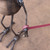 Small handcrafted found-object robot sculpture, robot 22004, close-up of the screw hands and feet