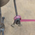 Small handcrafted found-object robot sculpture, robot 22007, close-up of the screw hands and feet