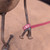 Small handcrafted found-object robot sculpture, robot 22070, close-up of the screw hands and feet