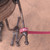 Small handcrafted found-object robot sculpture, robot 22080, close-up of the screw hands and feet