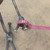 Small handcrafted found-object robot sculpture, robot 22109, close-up of the screw hands and feet