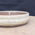 7 inch Paul Olson round bonsai pot, speckled white glaze, No. 627, close-up of the wall