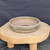 10 inch Paul Olson shallow round bonsai pot, khaki green glaze with textured band, No. 637, angled view