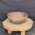 11 inch Paul Olson round bonsai pot, cream and rust glaze with incised waves, No. 638, angled view