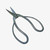 Professional bonsai pruning shears angled on a plain white background