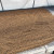 Wide view of hard premium akadama bonsai soil spread in a uniform layer