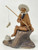 Matte finished Chinese mudman fisherman figurine in a meditative pose