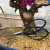 Yoshiaki bonsai shears beside a Bougainvillea bonsai in a dark blue pot