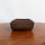 Three nested Udei brown unglazed pots in graduated sizes