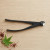 Yoshiaki concave bonsai branch cutters resting on a natural wood surface