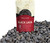 A product shot of a bag of Tinyroots Premium Soil Additive Black Lava, presented in a red and cream-colored resealable pouch. The bag is placed in front of a large, sprawling pile of the product—small, irregularly shaped, and porous black lava rocks. 

A semi-circular transparent window on the bag's front reveals the coarse texture of the lava rock inside. The red section of the label features bold white text that reads "BLACK LAVA" and highlights its benefits, including improving soil drainage, promoting plant oxygen, and its suitability for bonsai and succulents. Text at the bottom indicates the product is "sifted and ready to use." This image showcases a key component used in premium bonsai soil mixes to ensure optimal moisture retention and aeration for healthy root systems during the repotting process.