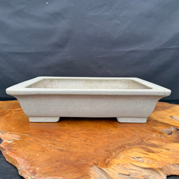 Reiho light gray rectangular bonsai pot 13.75 x 10.25 front view on wooden slab