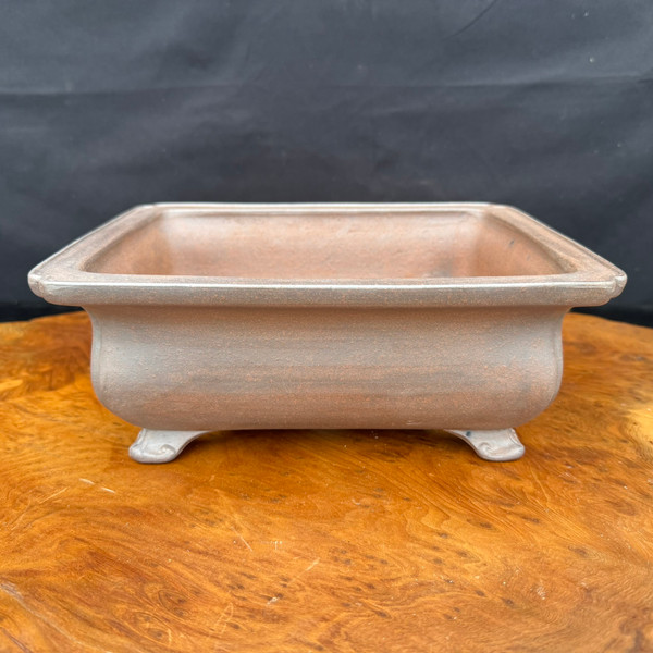 Front view of new deep unglazed rectangular Reiho Tokoname bonsai pot with rounded corners and scroll feet
