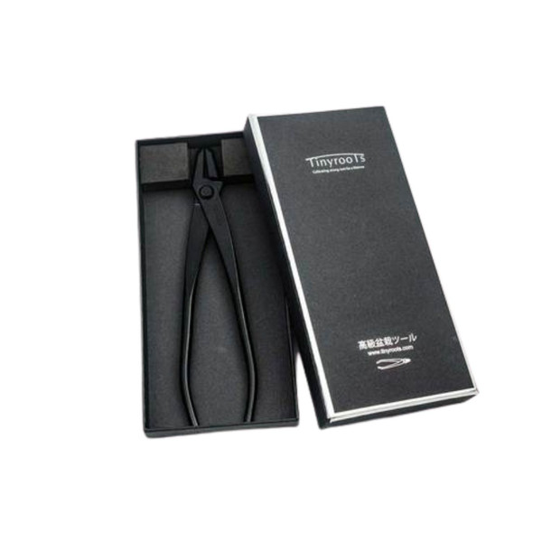 A pair of Tinyroots carbon steel Jin pliers resting in their black foam-lined presentation box with the lid placed alongside. These professional-grade bonsai tools feature a matte black finish, long slender handles, and narrow, precise jaws, making them ideal for manipulating, applying, or removing bonsai wire with precision. The packaging displays the Tinyroots logo and Japanese text meaning "high-grade bonsai tools," highlighting the quality and craftsmanship for bonsai enthusiasts.