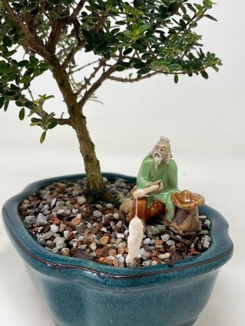 Chinese Figurine - Man Sitting Fishing with Hat on a Rock (F-025)