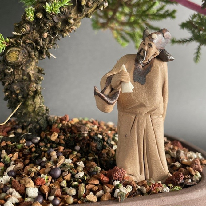 Chinese Figurine - Man Standing Holding a Scarf (F-030)