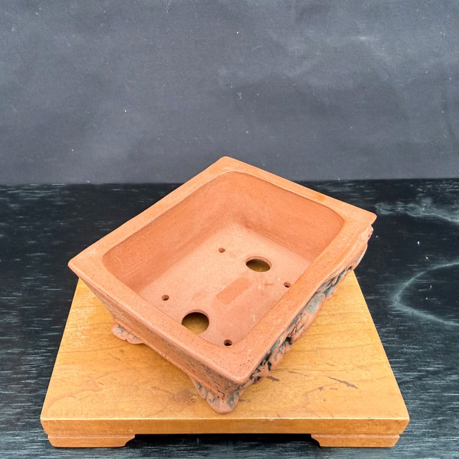Top view of Kouji Watanabe Tokoname rectangle bonsai pot showing interior planting area, drainage holes, and tie-down holes