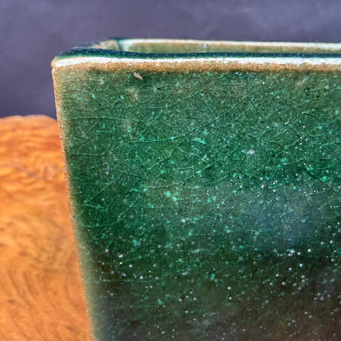 Close-up detail of Seizan Kiln accent pot showing deep green glaze and crackle surface character
