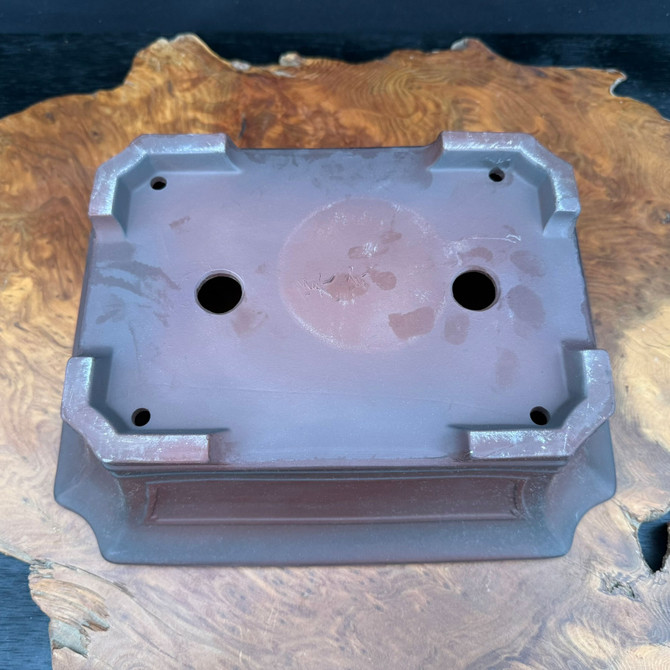 Bottom view of 12 inch Bigei Tokoname rectangle bonsai pot showing feet, drainage holes, and Bigei signature