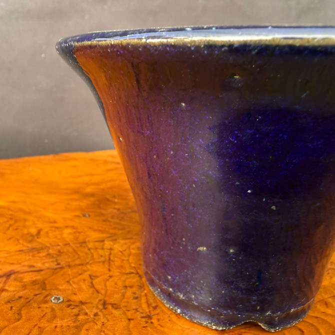 Close view of Shuho blue glazed flared round bonsai pot showing glaze detail